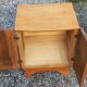 Pair of vintage bedside tables in blond and gilded oak from the 50s