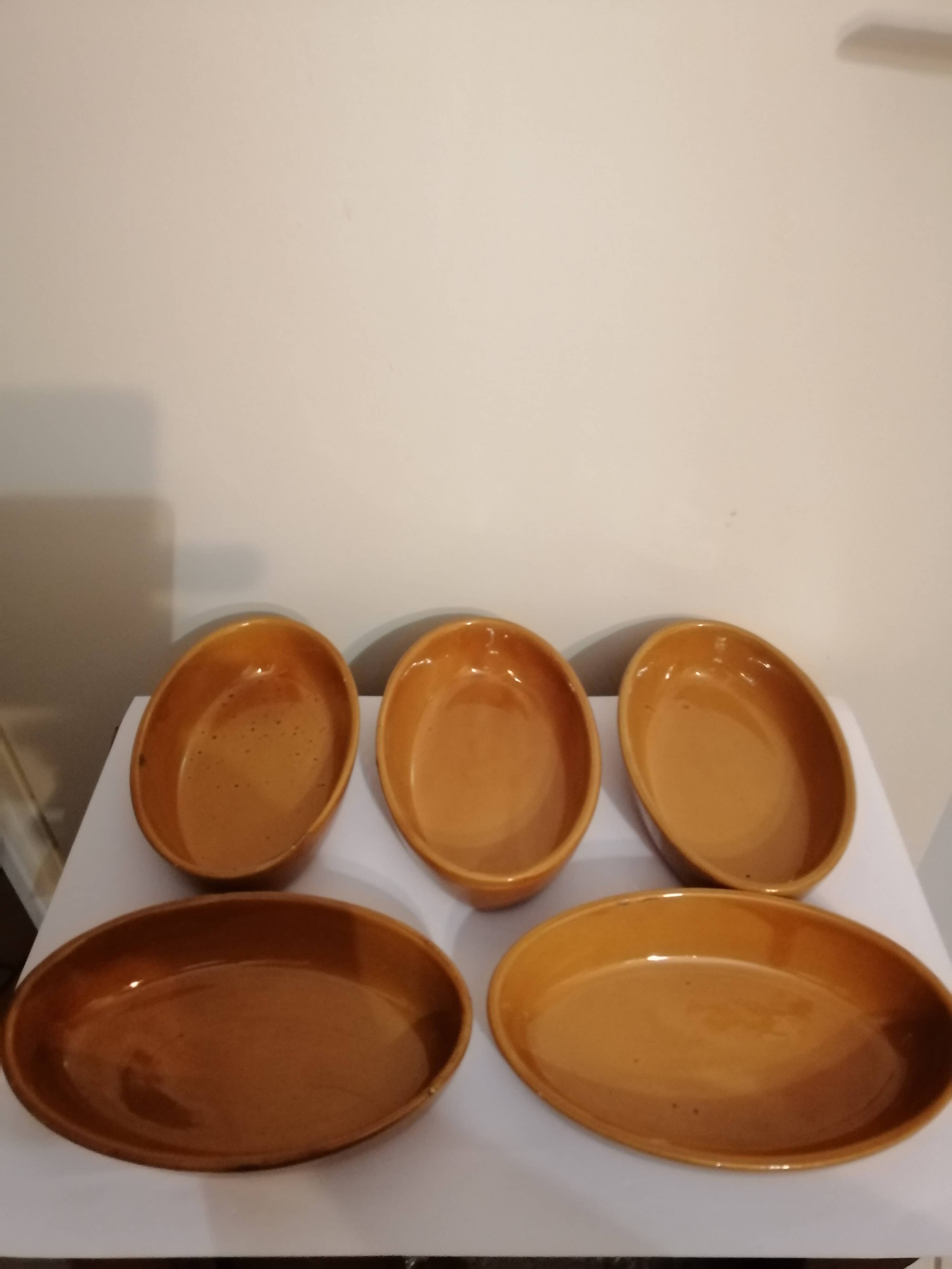 Set of 5 small old enameled terracotta dishes