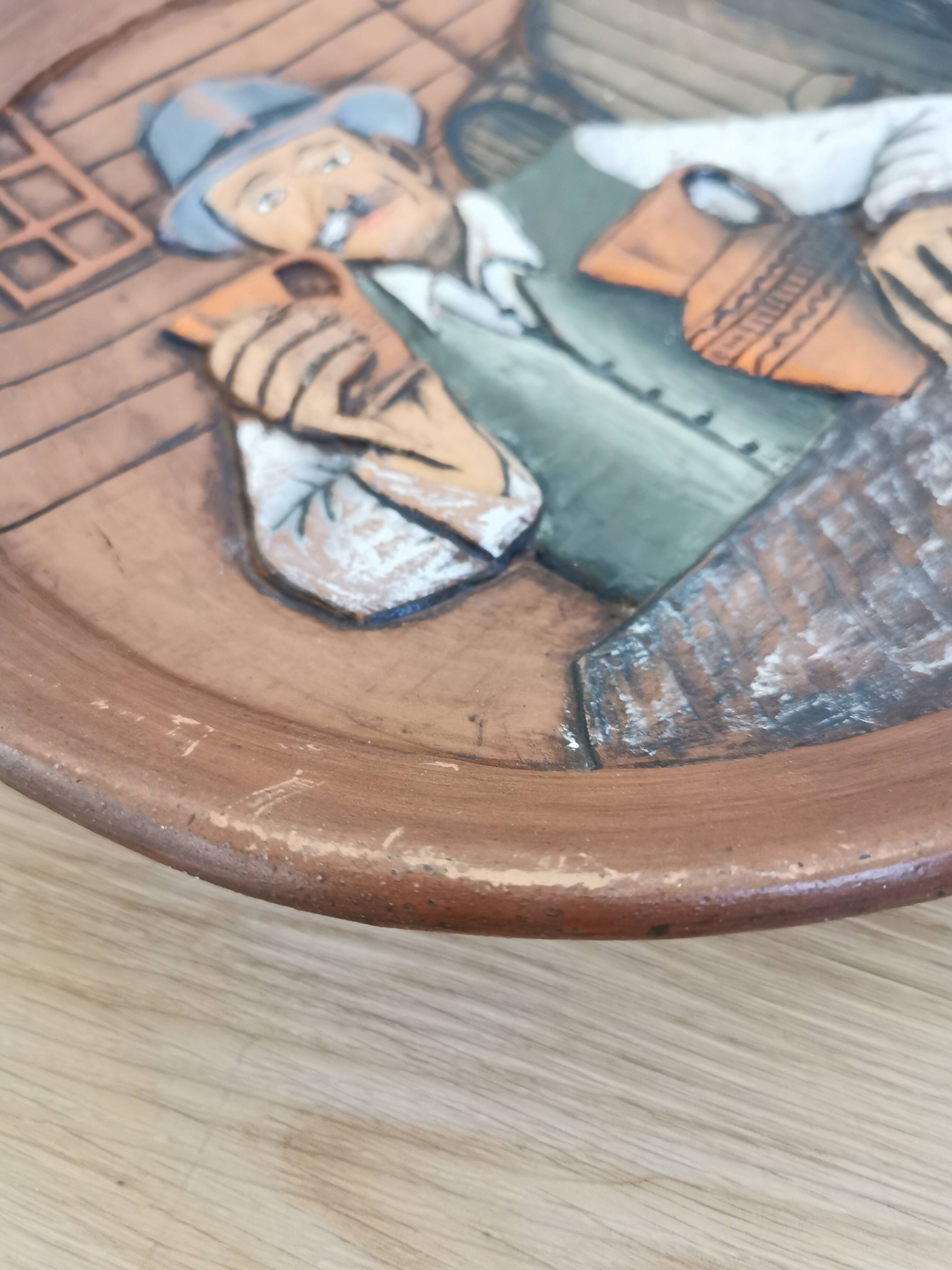 Vintage Embossed Clay Plate: Man Drinking, Retro Wall Decor