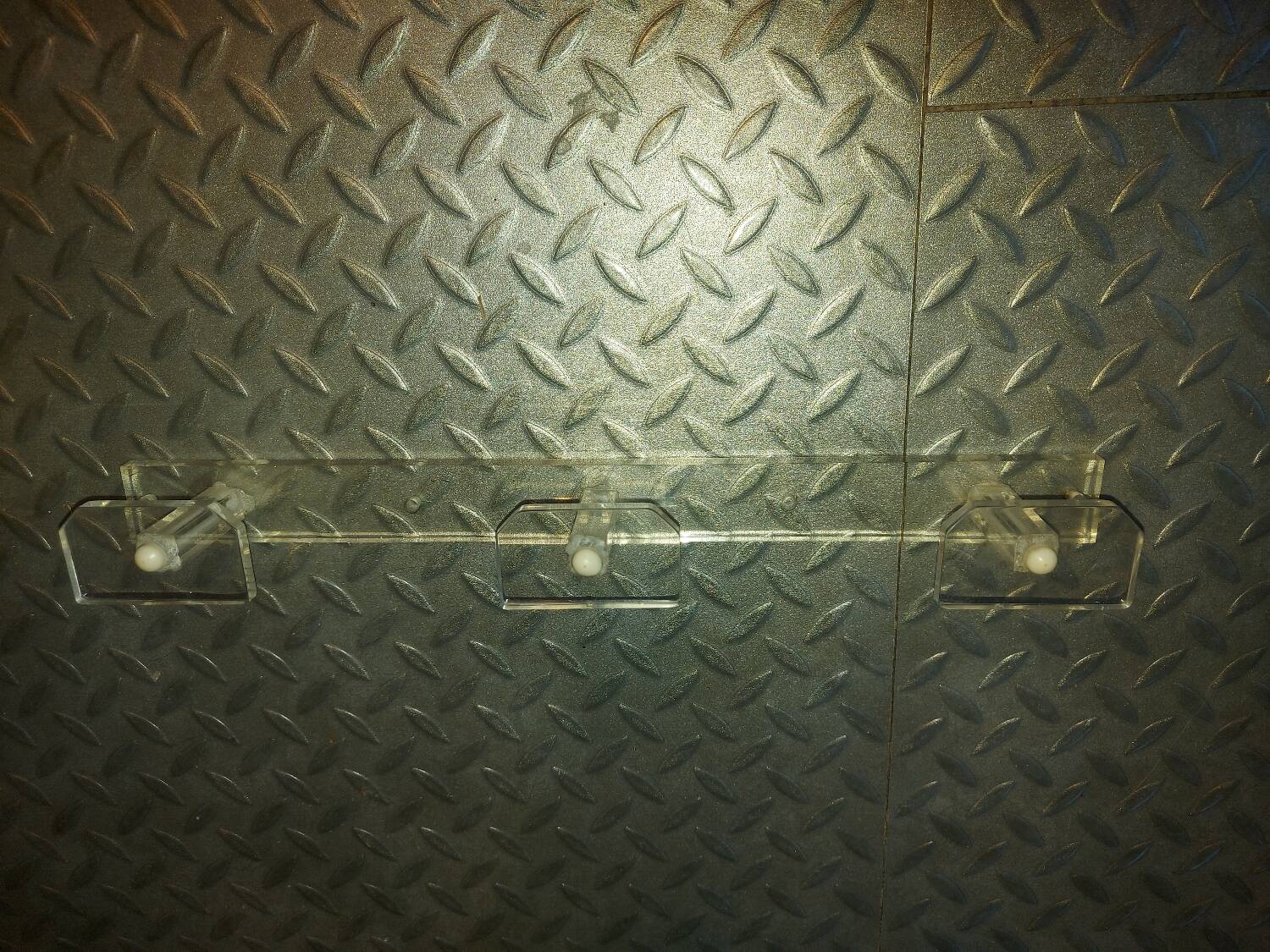 Vintage wall-mounted plexi coat rack