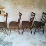 Eight mismatched bistro chairs