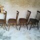 Eight mismatched bistro chairs