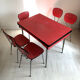 Table and chairs in vintage red formica 60s