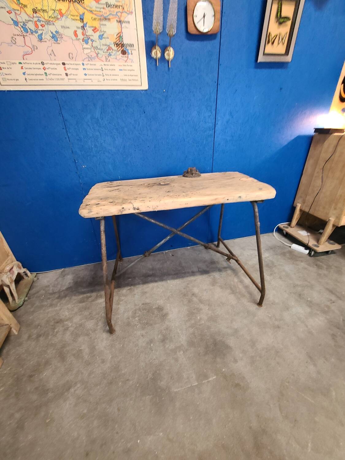 Vintage workbench circa 1930, folding metal leg.