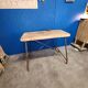 Vintage workbench circa 1930, folding metal leg.
