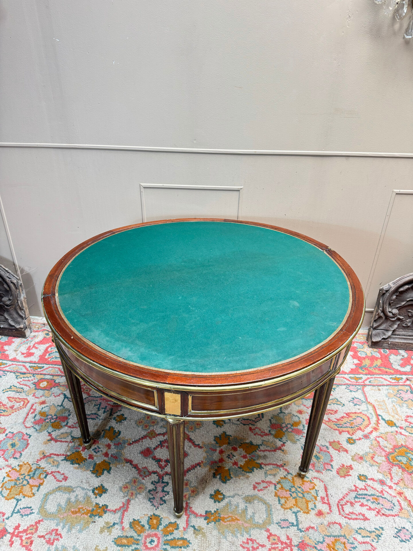 Half-moon table in mahogany from the Louis XVI period, 18th century.