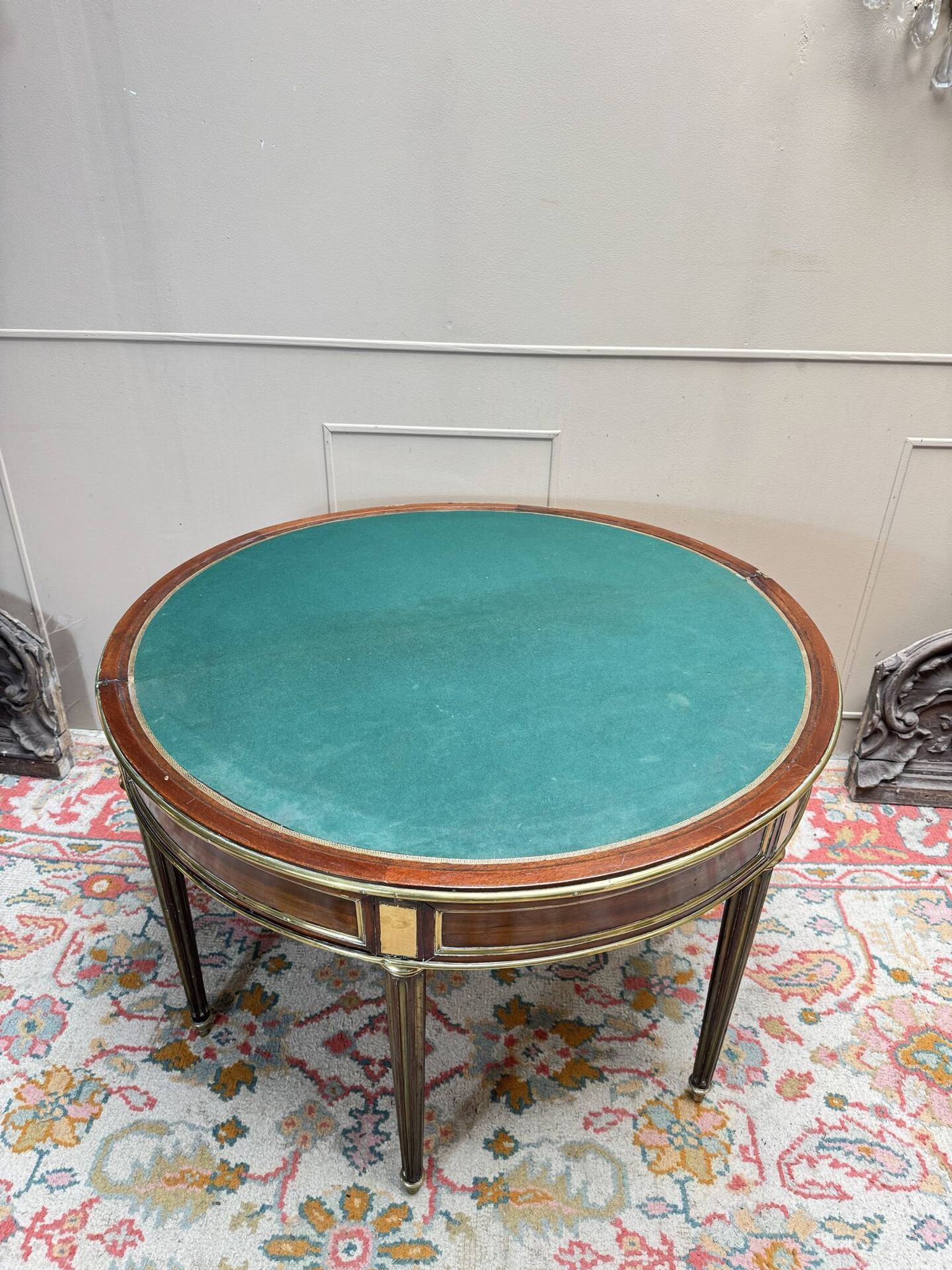 Half-moon table in mahogany from the Louis XVI period, 18th century.