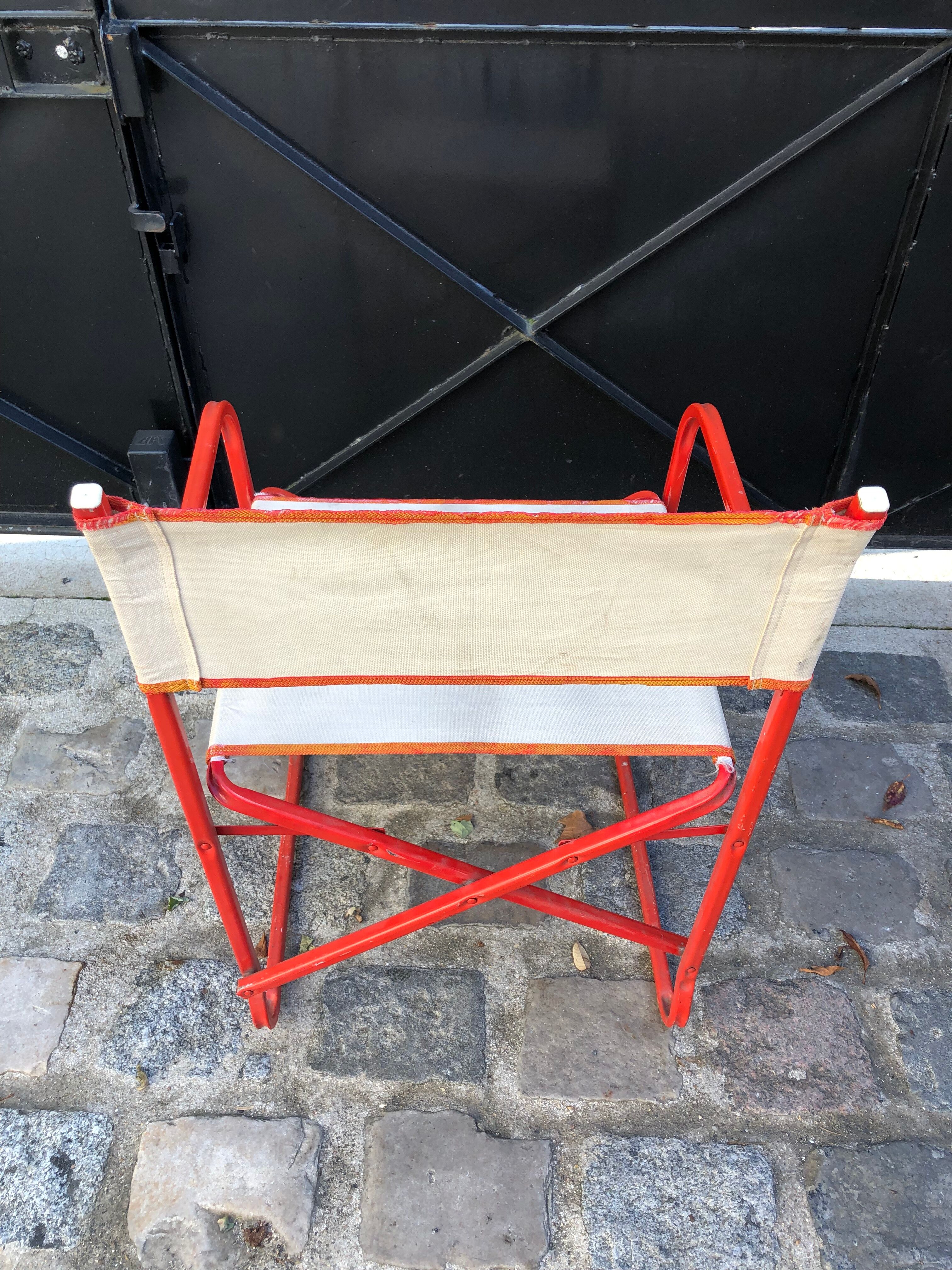 Folding metal armchair