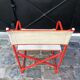 Folding metal armchair