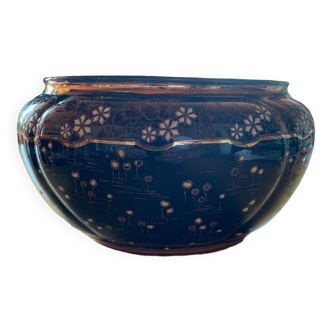 Old navy blue pot cover with small white flowers
