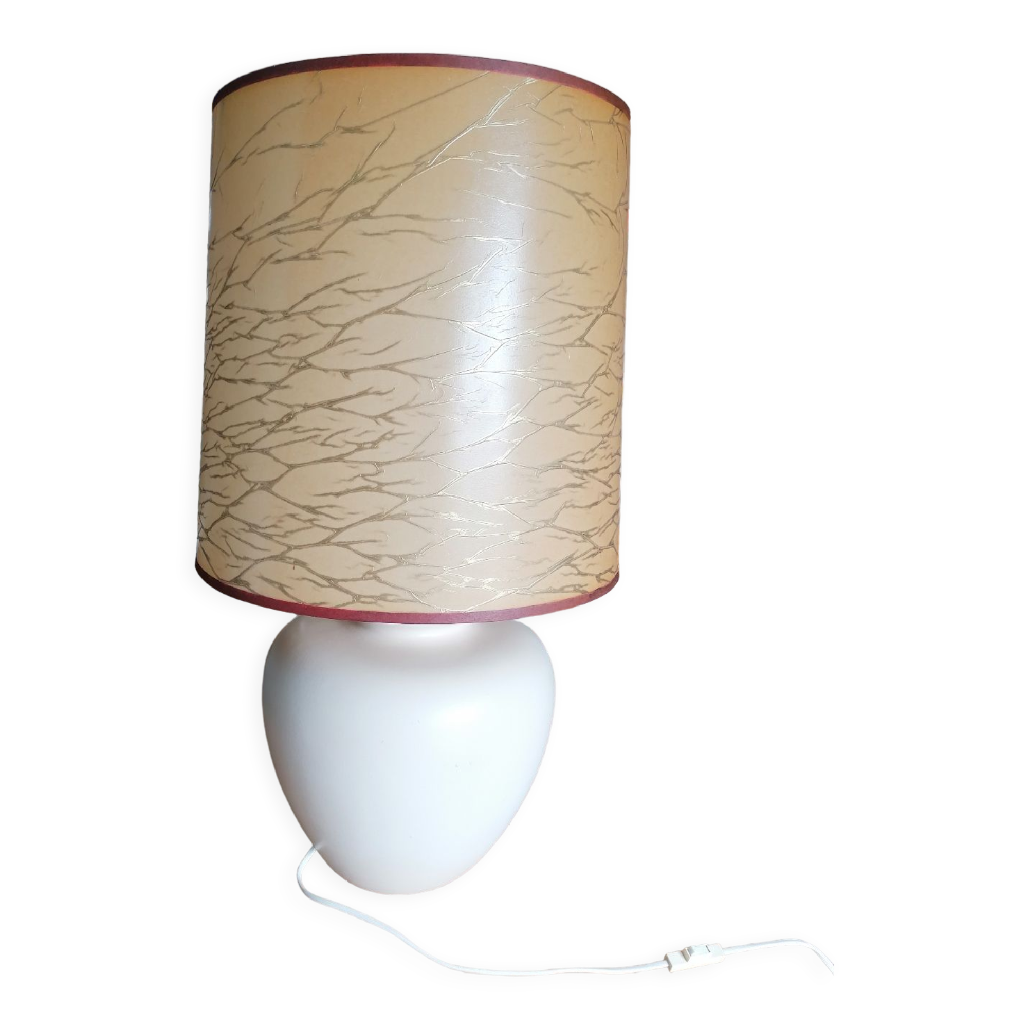 Vintage ceramic table lamp and golden lampshade.