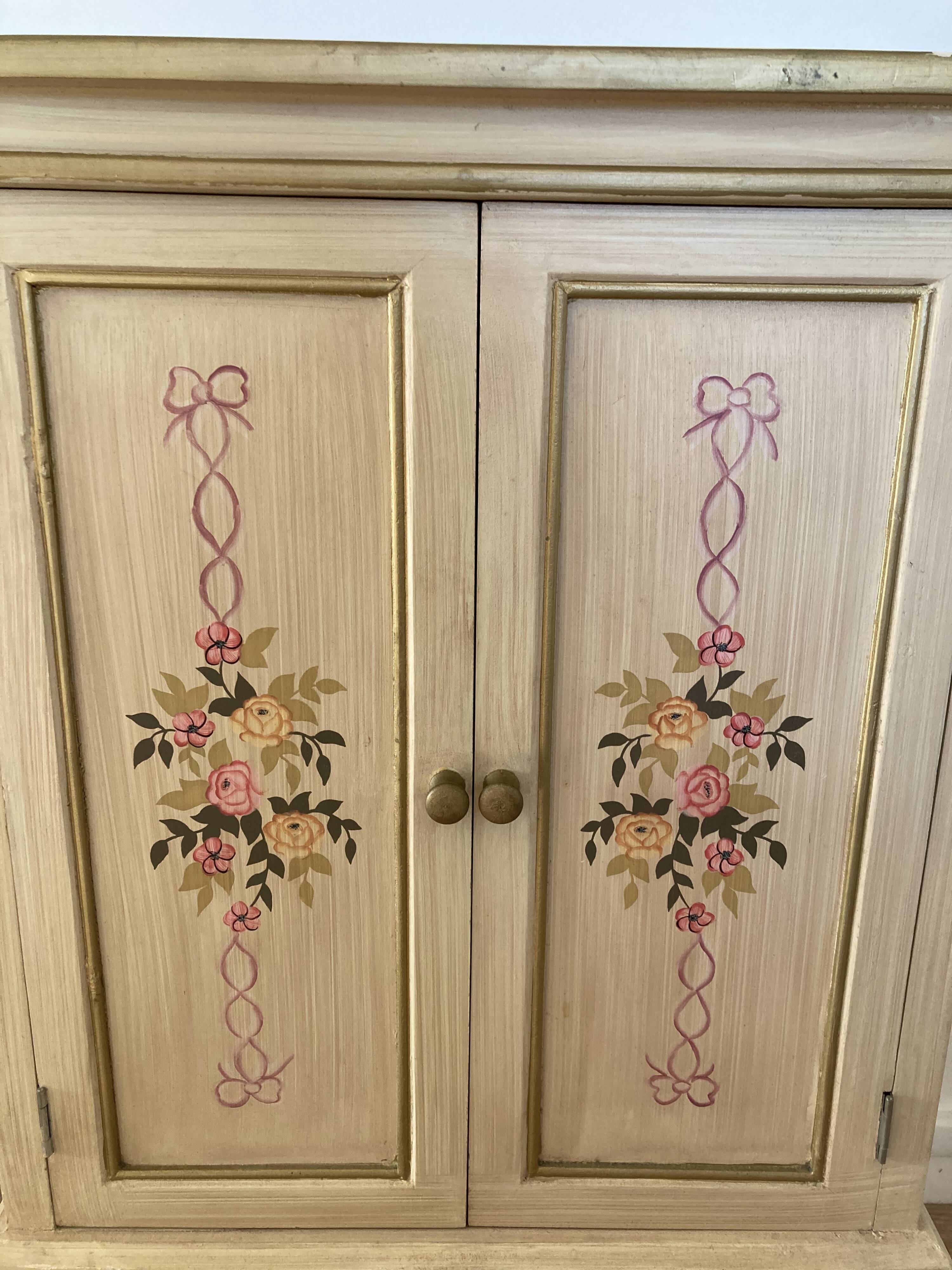 2-door flowered wooden cabinet