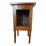 Open wooden bedside table
