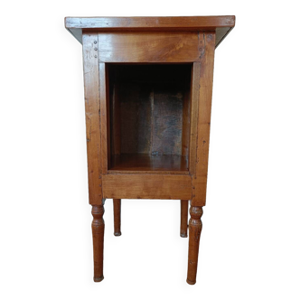 Open wooden bedside table