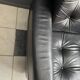 2 Black leather arm chairs 1960s on wheels