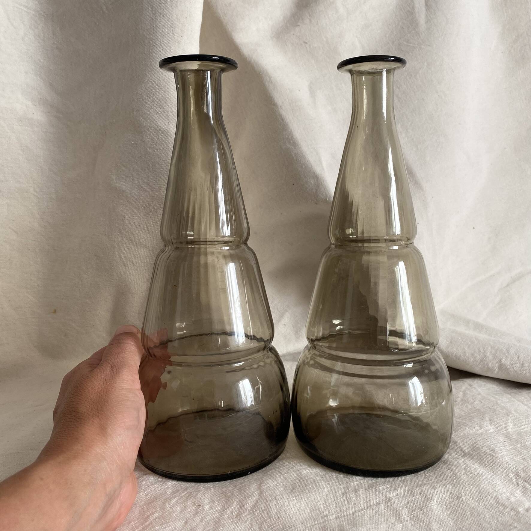 Pair of antique smoked glass vases carafes