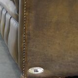 2.5 seater leather chesterfield sofa in a moss green color