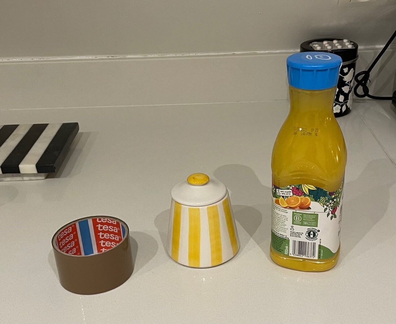 Yellow and white striped cover pot