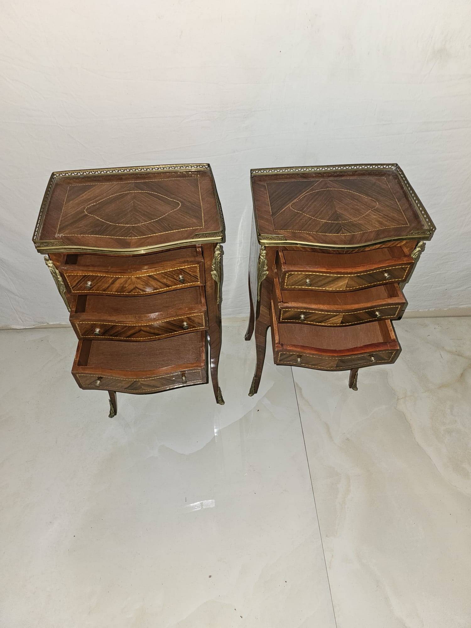 Pair of Louis XV style bedside tables in marquetry