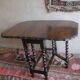 Antique farmhouse patinated extendable table in oak with carved edge, 1900