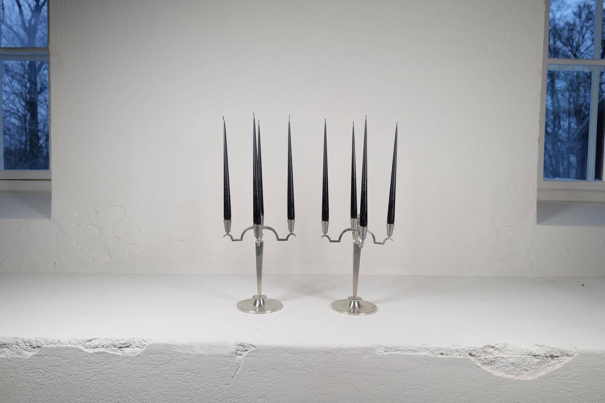 Sculptural Art Deco set of chandeliers in tin, Sweden, 1940s.