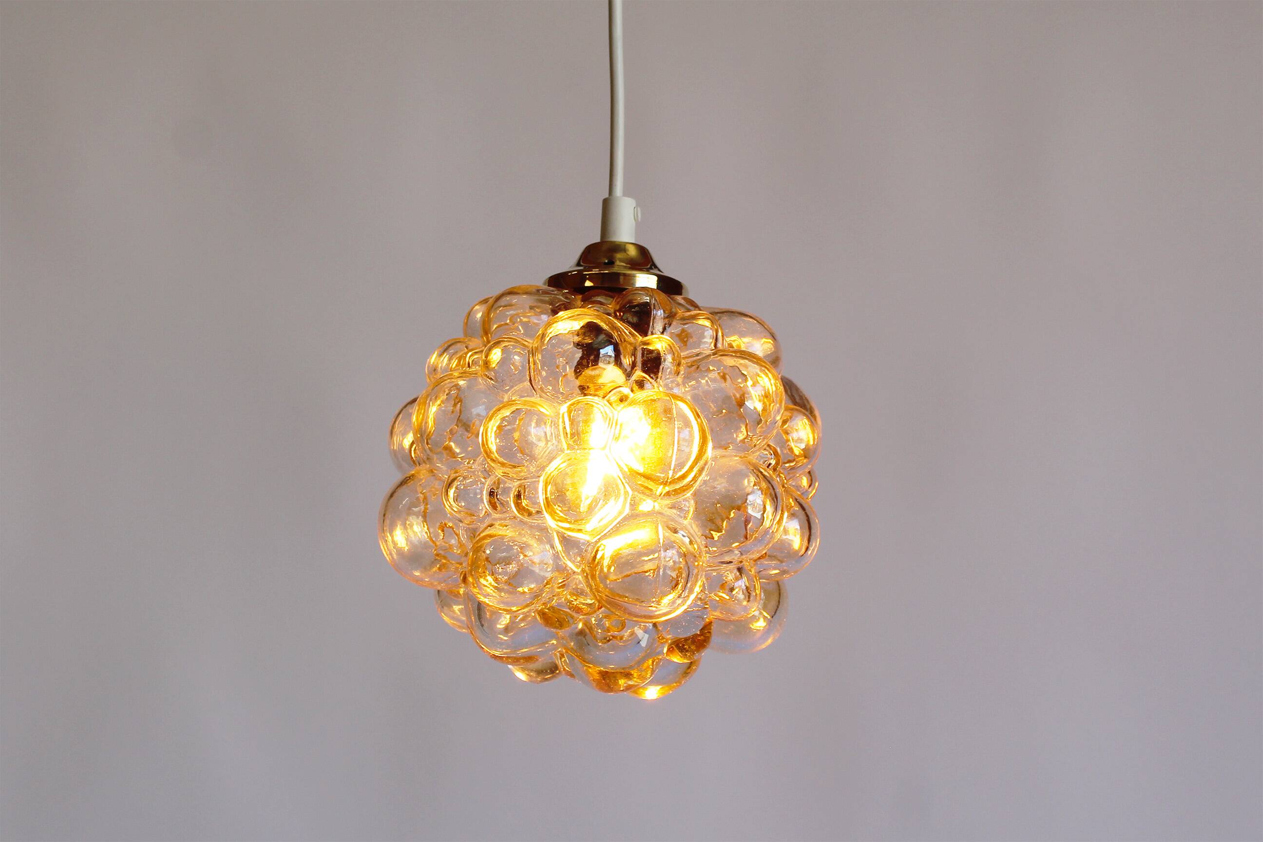 Petite amber bubble glass pendant light by Helena Tynell for Glashutte Limb