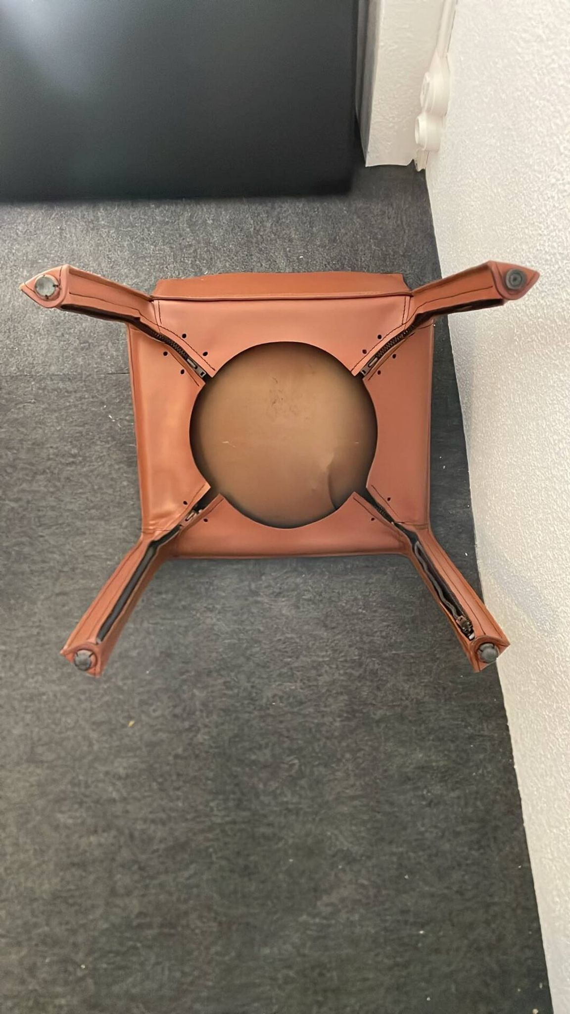 Brown leather zipped chair in Bellini style, Italian design.