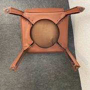 Brown leather zipped chair in Bellini style, Italian design.