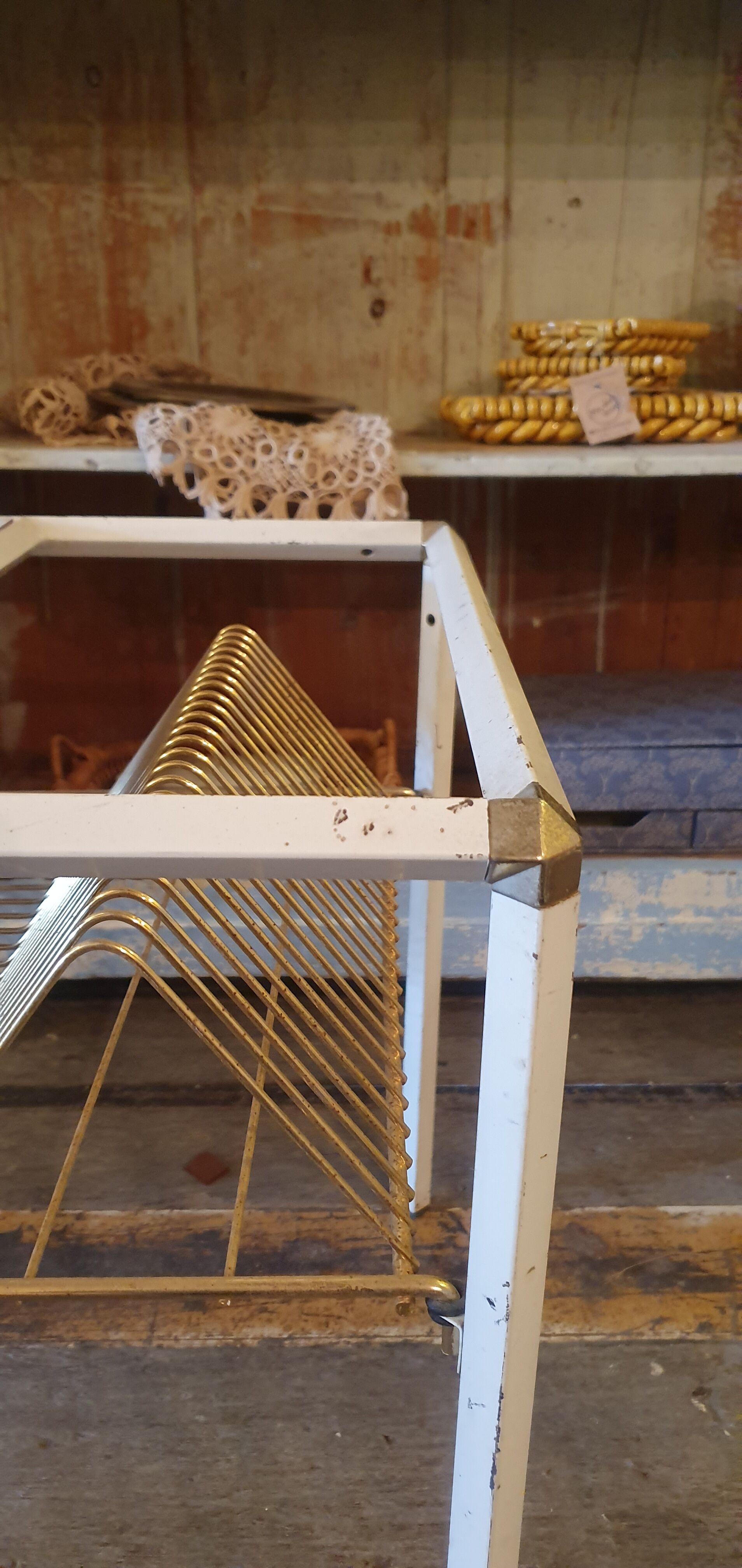 White coffee table and vintage gold metal