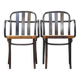 Set of 2 vintage wooden design dining/bistro chairs with woven seats