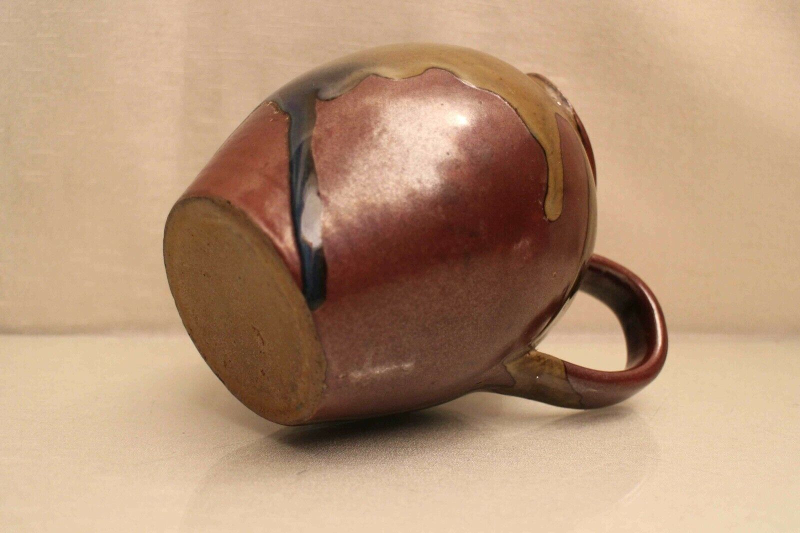 Pitcher in glazed sandstone