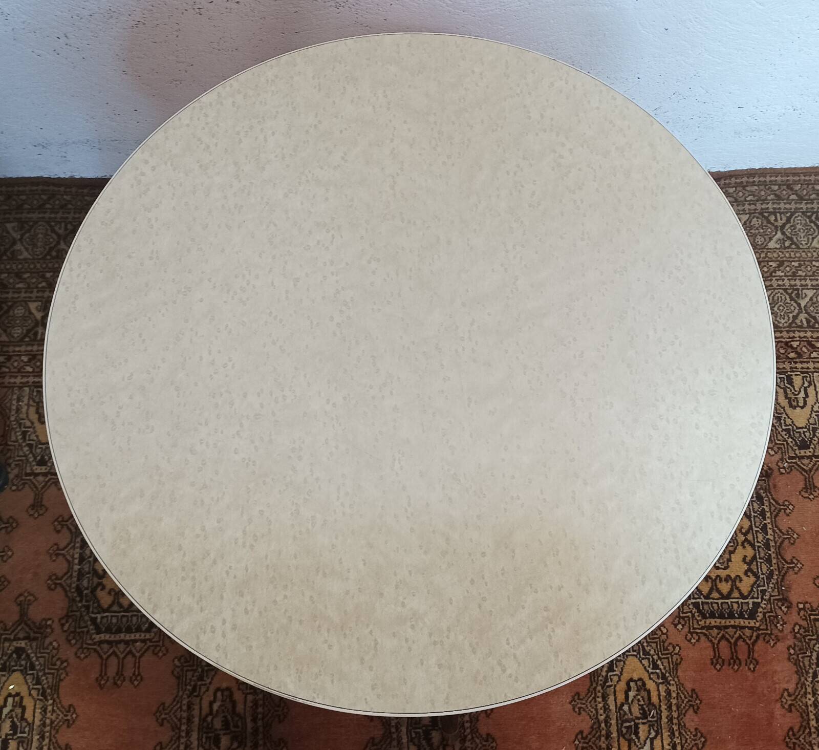 Vintage tripod side table in wood and formica.