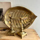 Old brass pocket vacuum, leaf.