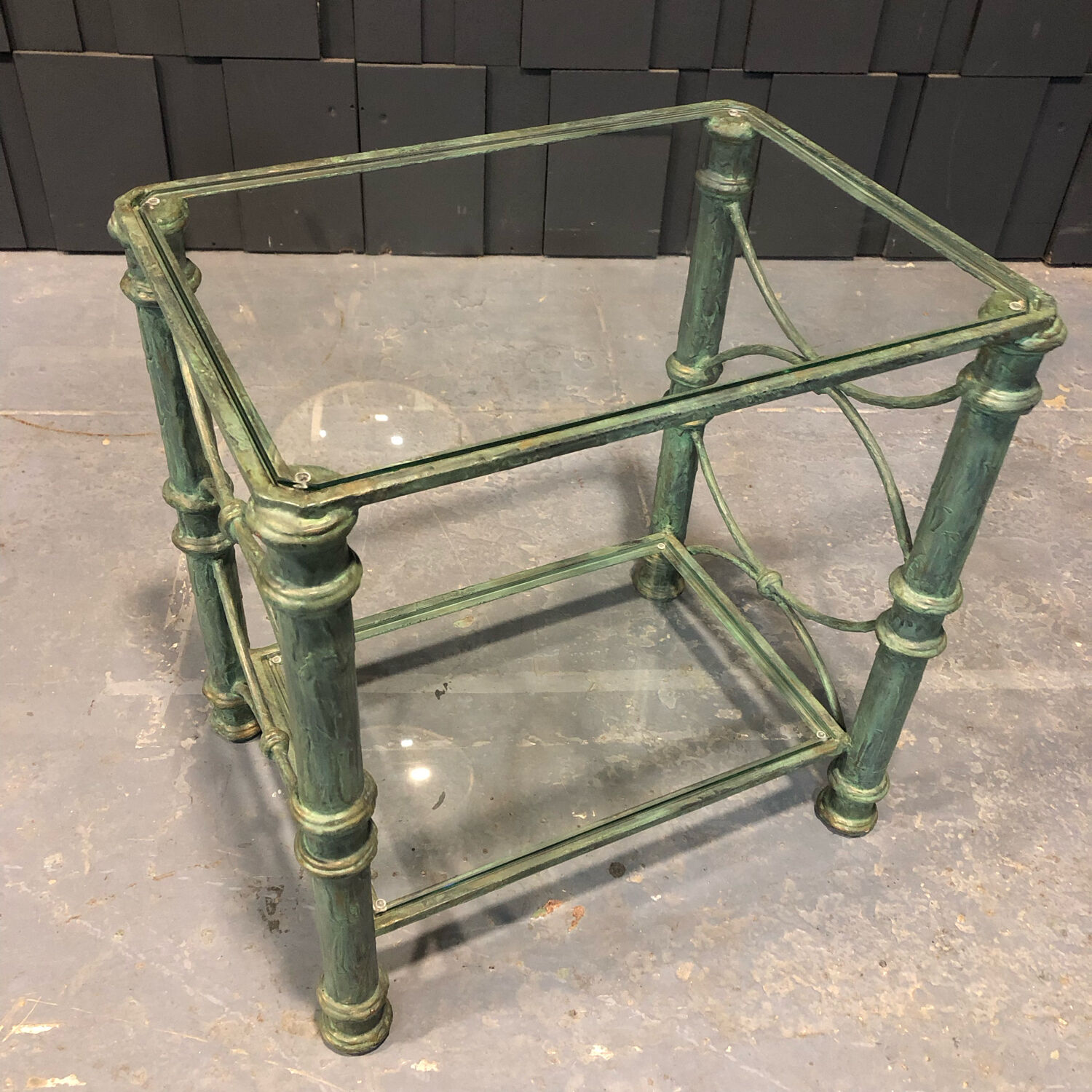 Iron and glass side table with antique patina