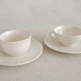 Two ivory cups and saucers from Sarreguemines