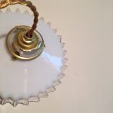 Pair of white opaline hanging with transparent serrated edges