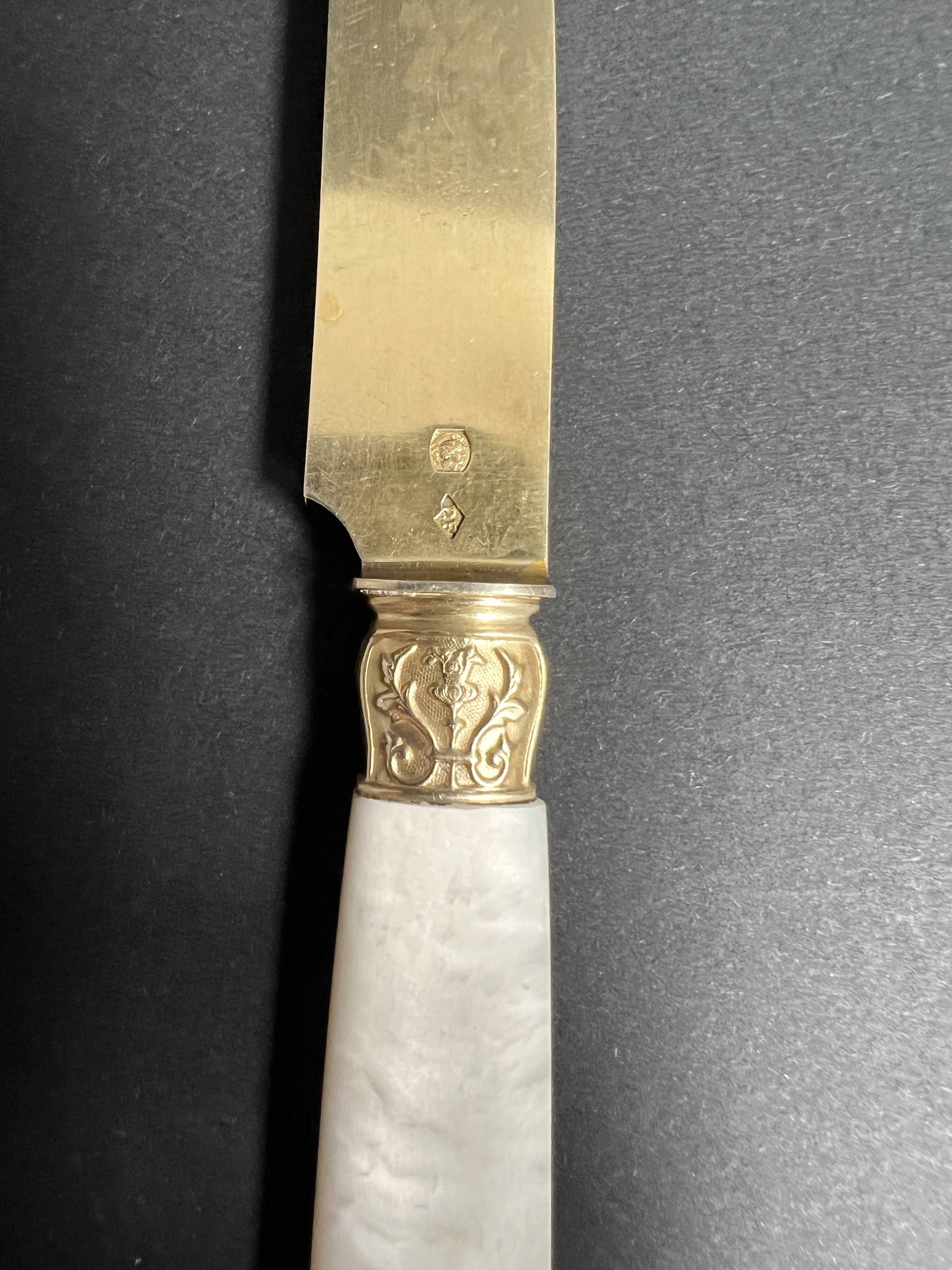10 Fruit knives in solid silver and vermeil mother-of-pearl