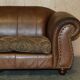 Vintage leather sofas by Thomas Lloyd with Kilim cushions.