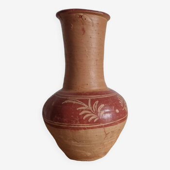 Old handcrafted terracotta vase