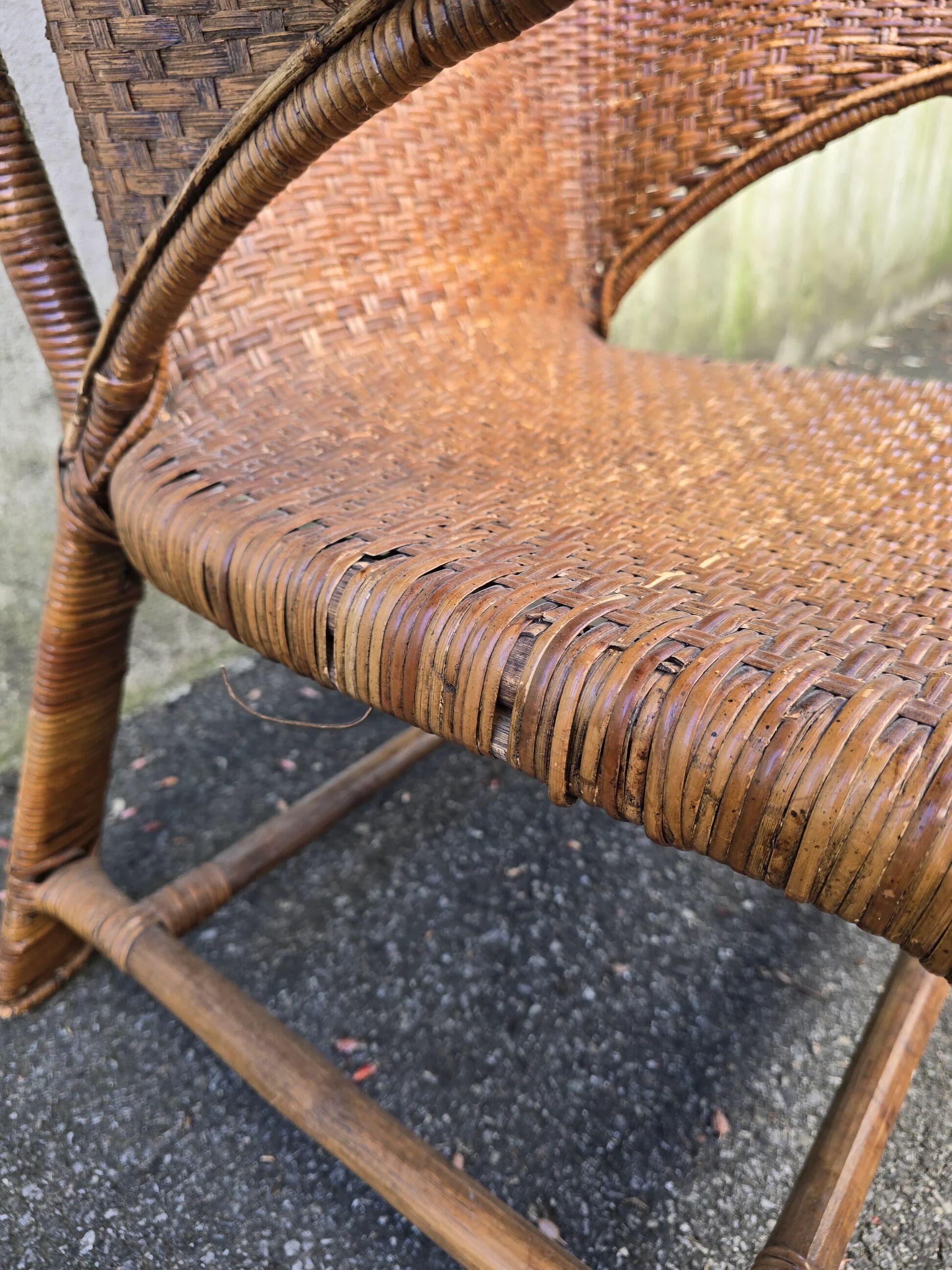 Arts & Crafts armchair in wicker and rattan attributed to Dryad & Co, UK, circa 1920.