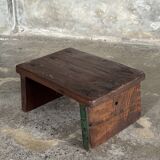 Small auxiliary stool in upcycled teak with traces of green chrome on the leg.