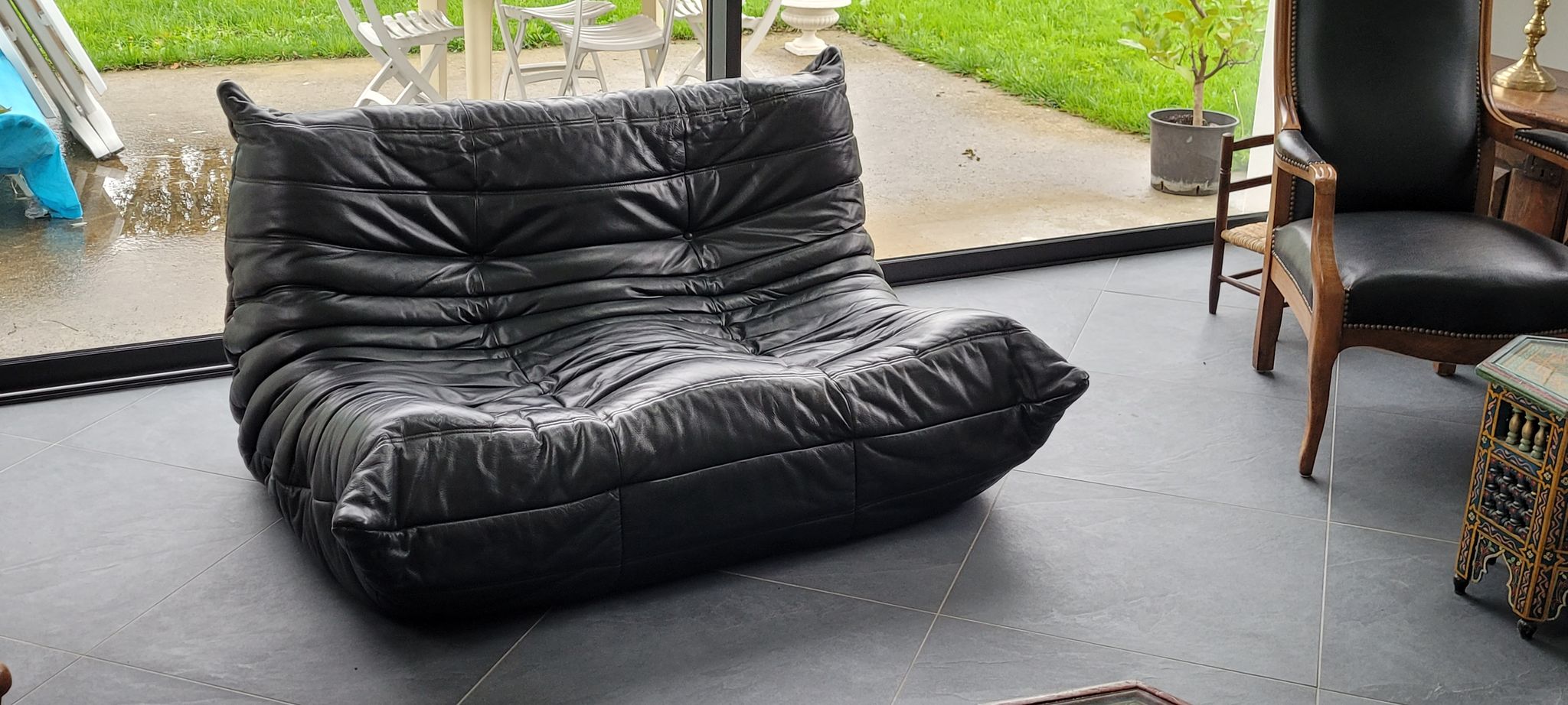 Togo black leather sofa 2 places by Michel Ducaroy for Ligne Roset in 1973