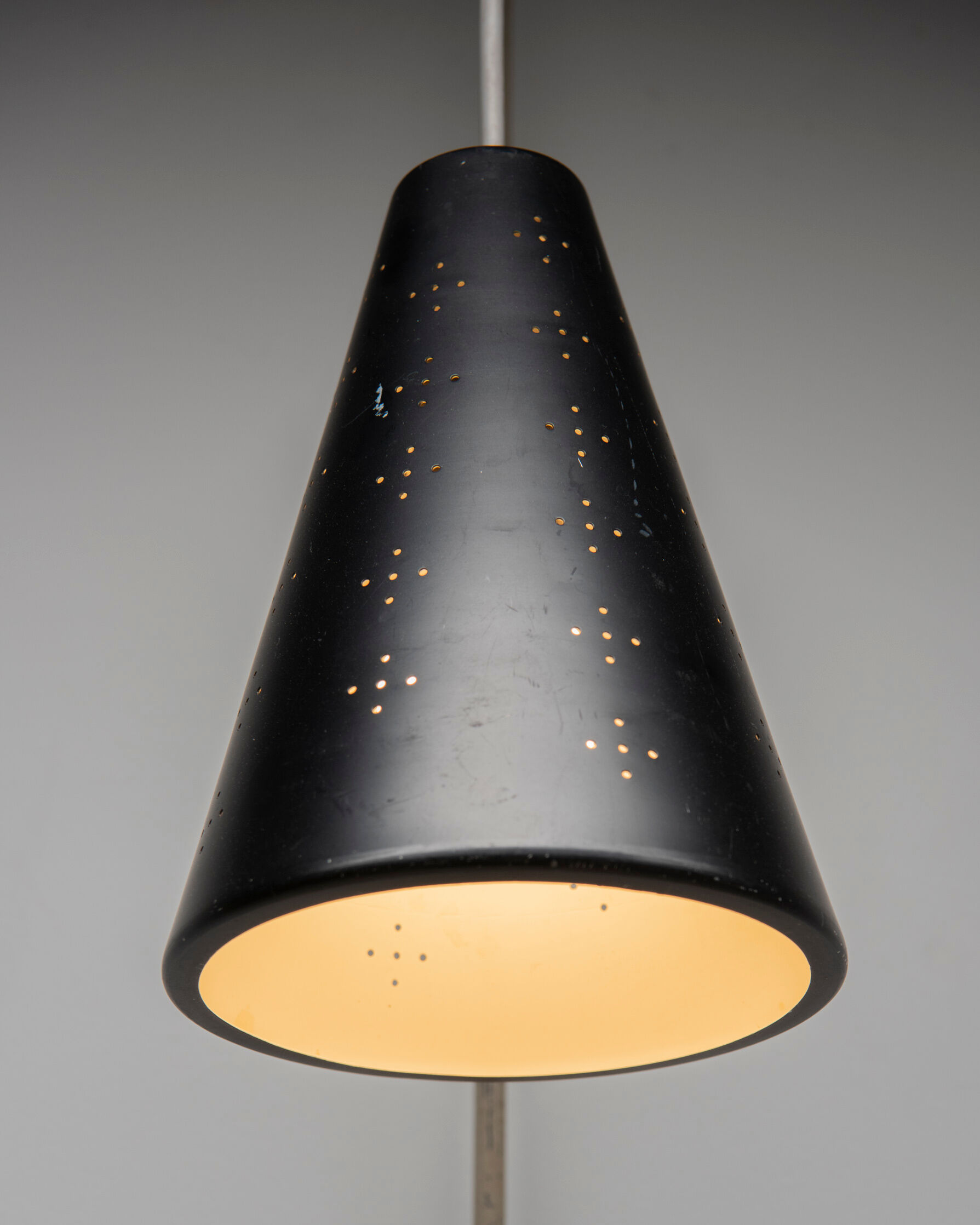 Hanging wall lamp with black perforated cap, 1960's