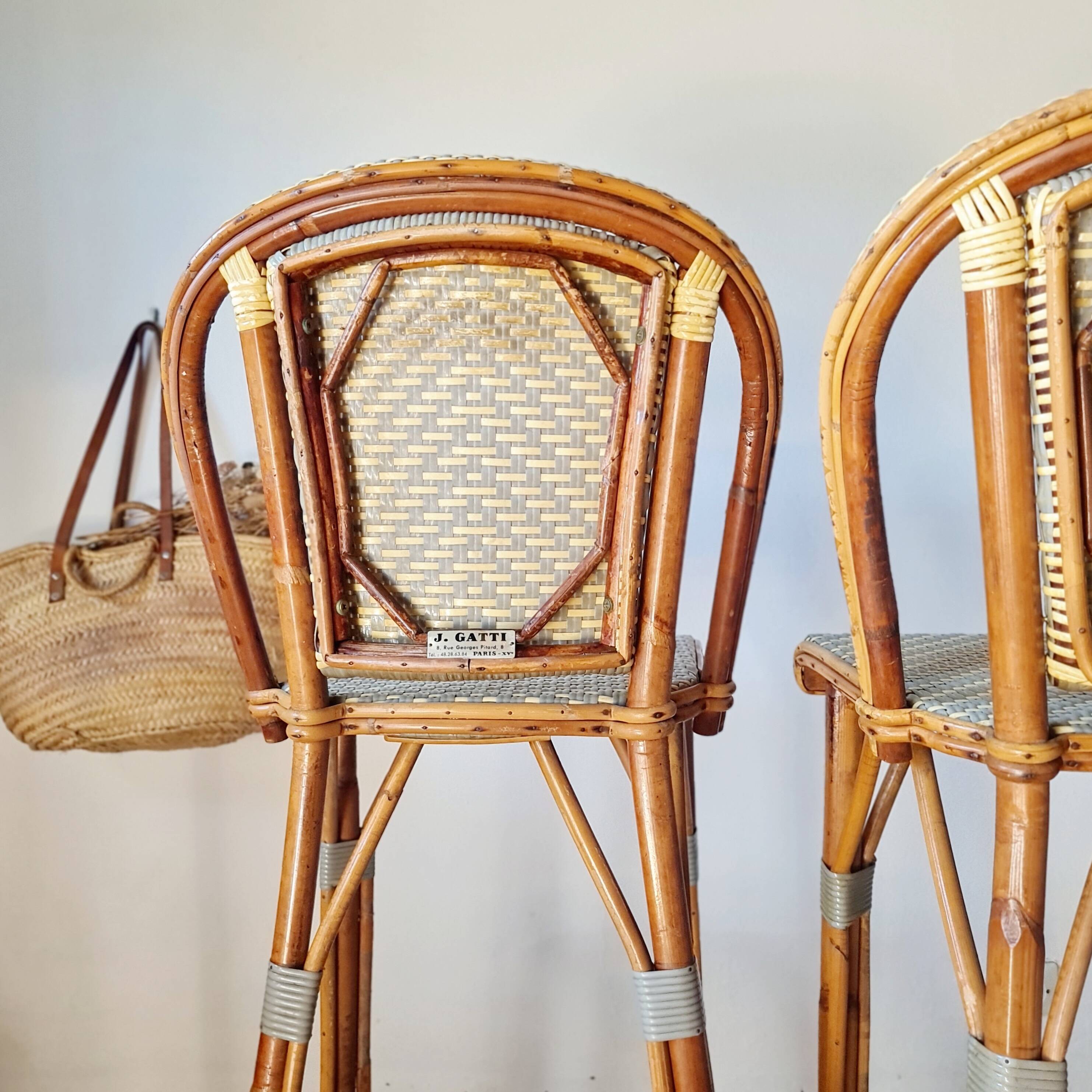 Vintage Gaty bar stools in two-tone rattan and cane.