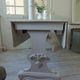 Console, solid walnut table, foldable extensions, grey patinated legs.