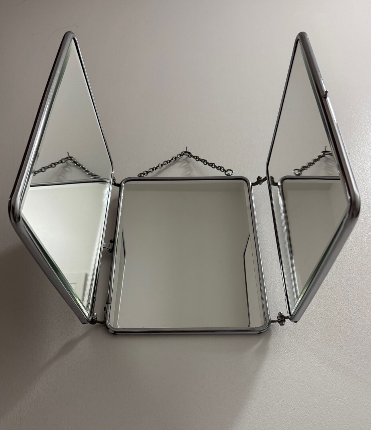 Bevelled triptych barber mirror from the 1950s.