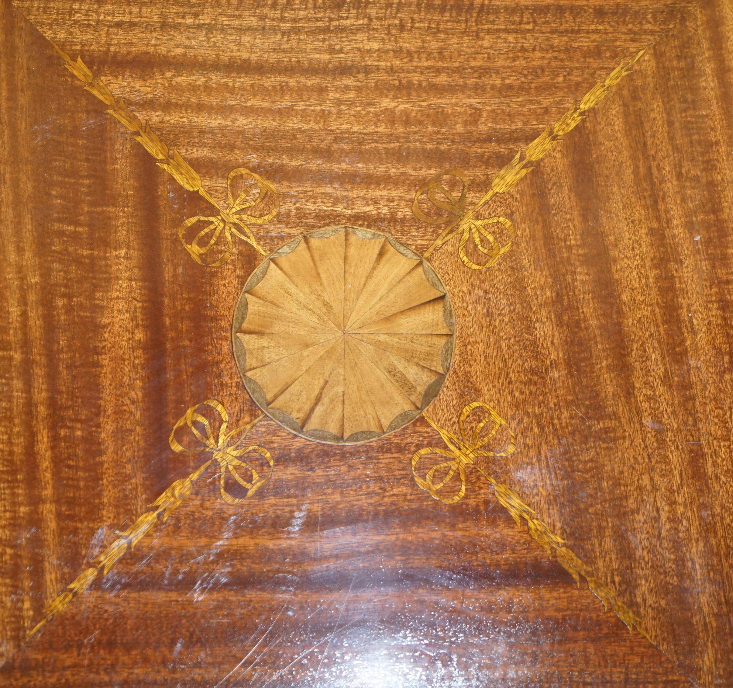 Edwardian burr walnut revolving bookcase with Sheraton inlays circa 1900