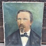 PORTRAIT OF A MAN WITH AN EARRING SIGNED P GARNIER