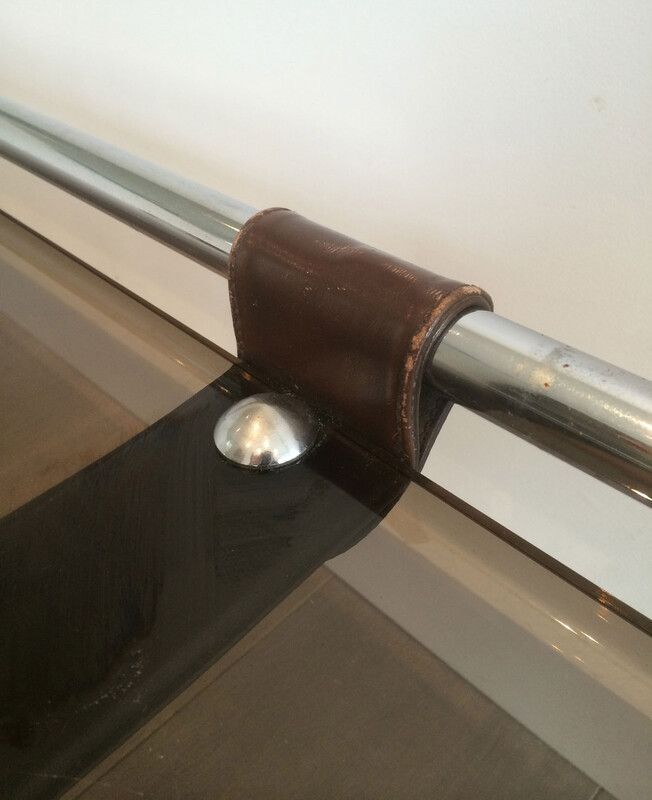 Coffee table in chrome, leather, and smoked glass