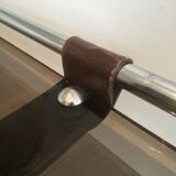 Coffee table in chrome, leather, and smoked glass